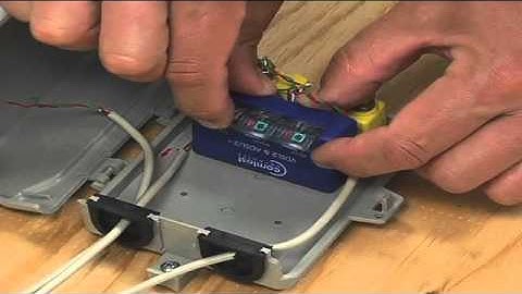 Comtest NID-01V Splitter on a Ground Post of Telco box