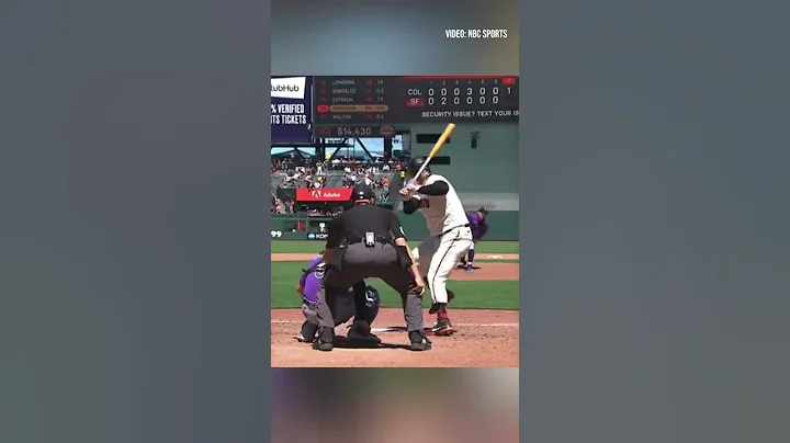 Rockies catcher Brian Serven catches both ball and...