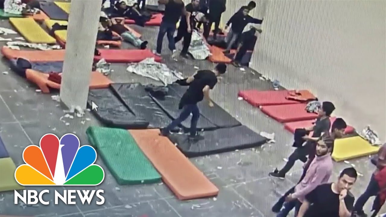 Questions grow after surveillance video shows deadly migrant center fire