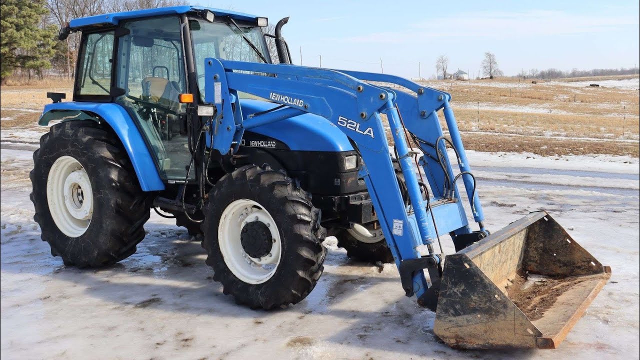 New Holland TL100 Cab Tractor with New Holland 52LA Front End Loader and Bucket