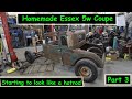 Homemade Essex coupe working on the rear window and corner windows.