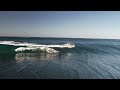 Surfers take on a heavy slab south of Sydney