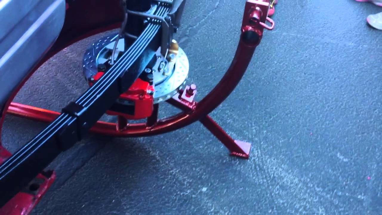 Walker auto Works putting a Mustang on her side at  Dr. George car show part 2