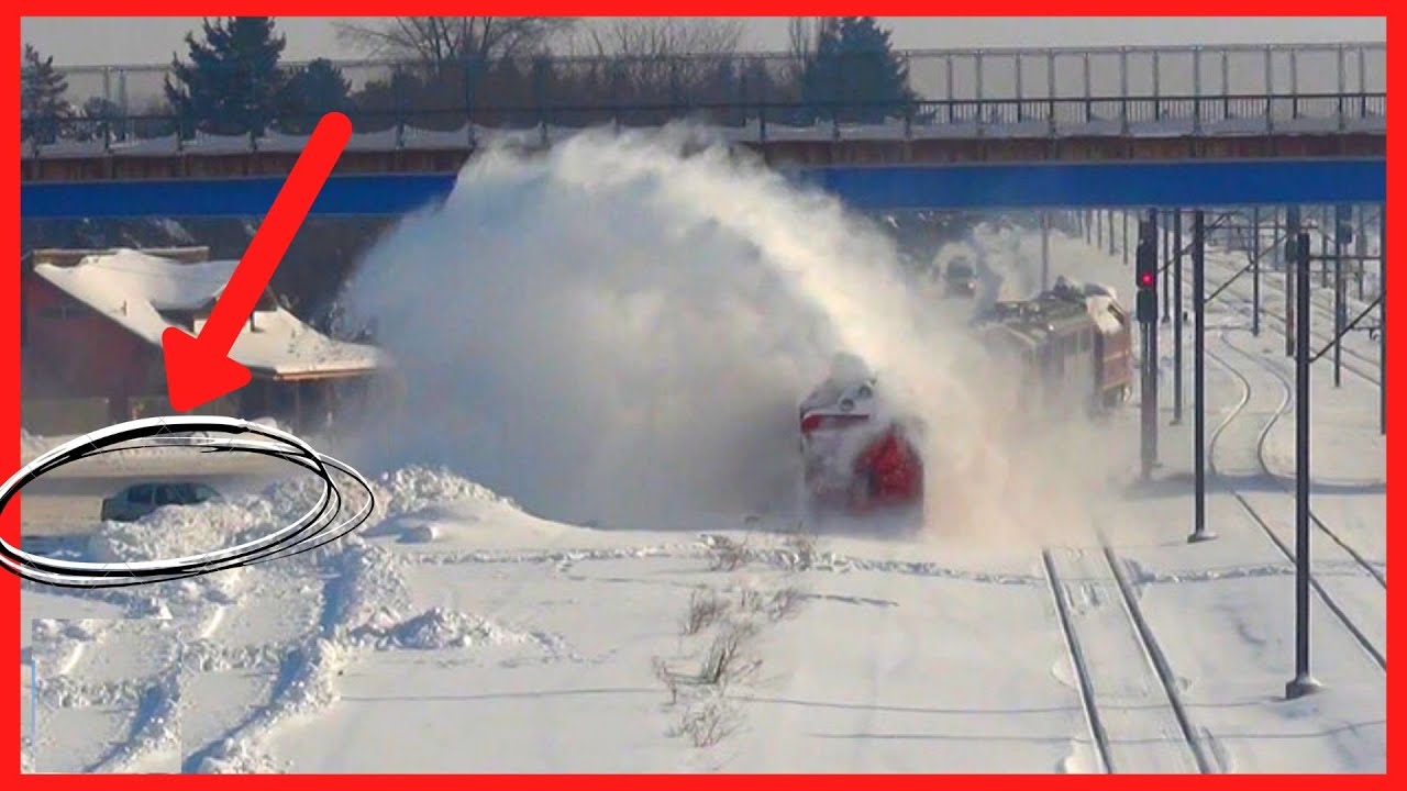 Train Snow Blower Throwing Snow on Road, Cars and Houses Train Snow