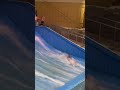 Me surf boarding at a hotel