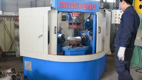 Elbow beveling machine