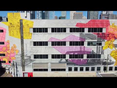 Inauguration de la plus grande murale de Montréal sur le pavillon A de l'ÉTS - Un véritable voyage historique au cœur du quartier Griffintown