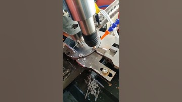 Rotary nut automatic tapping machine