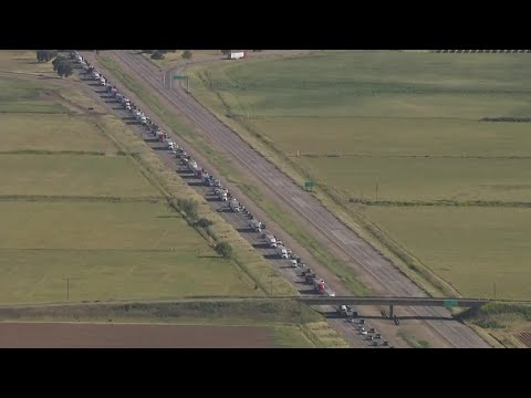 WATCH: LiveCopter 3 shows big rig crashed over overpass on I-5