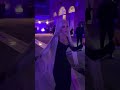 Doja Cat dances with drink in her hand