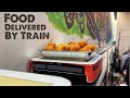 Japanese Food Arrives on Train Conveyor Belt