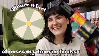 spinner wheel chooses my horror books  | READING VLOG of new horror releases