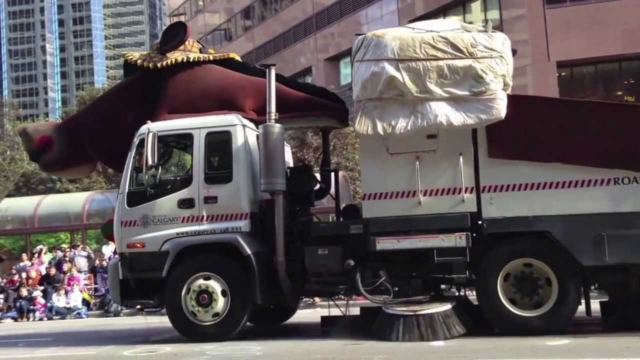 Calgary Stampede Parade Street Sweepers Costumed Up Like Cows And