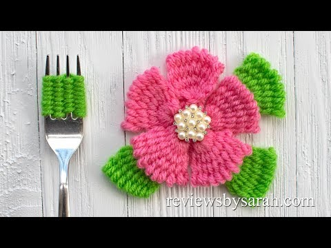 فيديو: كيفية صنع زهرة من الغزل
