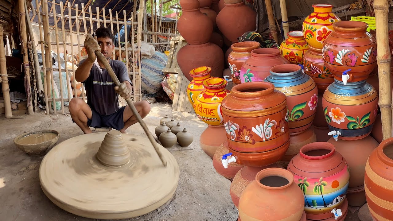 Traditional Indian Potter Making Clay Pot On Manual Pottery