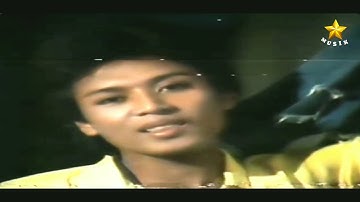 Muchlas Ade P - Rambut Hitam Kepang Dua