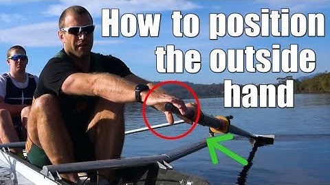 How to position the outside hand when rowing