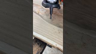 Detailing and carving with the Arbortech precision carving system to make this cool river table