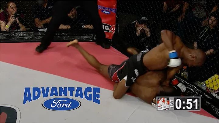 Joel Powell rains blows down on  Christ Franck