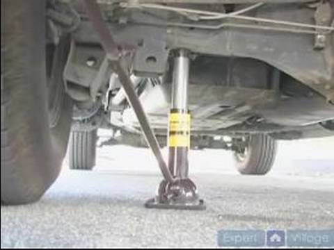 How to Change A Flat Tire : How to Jack Up A Car