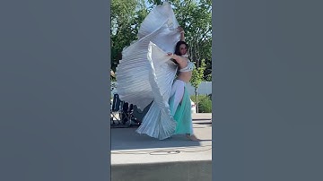 Sahira of Mythic Moves Bellydance performing with Isis Wings