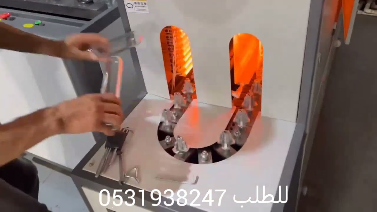 ماكينة نفخ قوارير مياه ٥ لتر