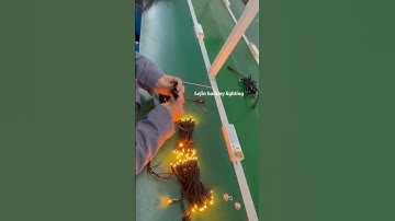 Immersive experience factory production of string lights throughout the process#factory
