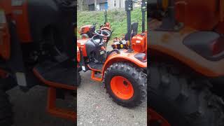 Big Al showing you around a CK2510 with a pull behind mower.