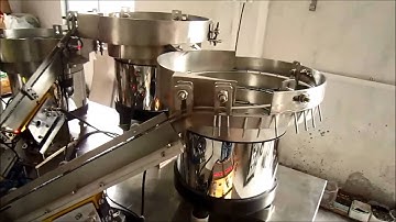 Automatic screw packaging machine with counting systems for hardware fastener