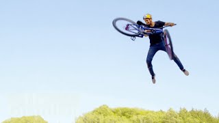 Polish mountain biker lands world's first quadruple tail whip