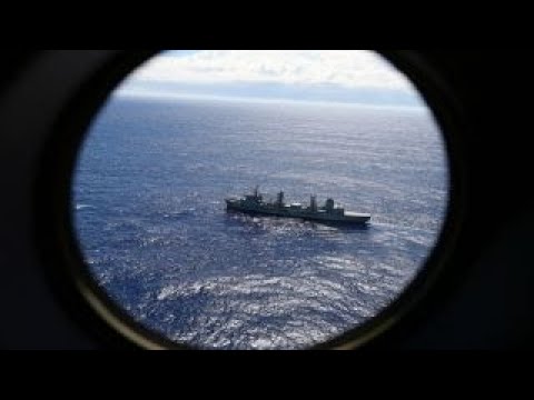 Scientists narrow search area of Flight 370