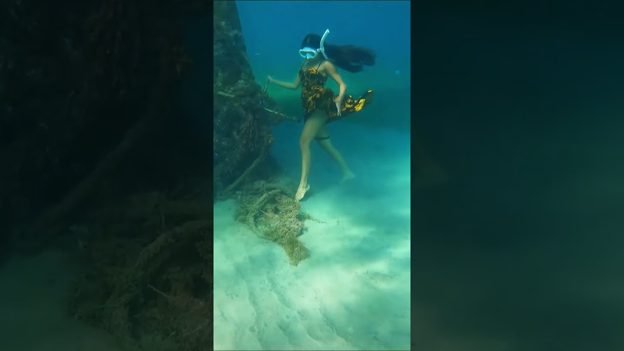 Wearing maxi dress underwater, looks easy but nah nevermind.  