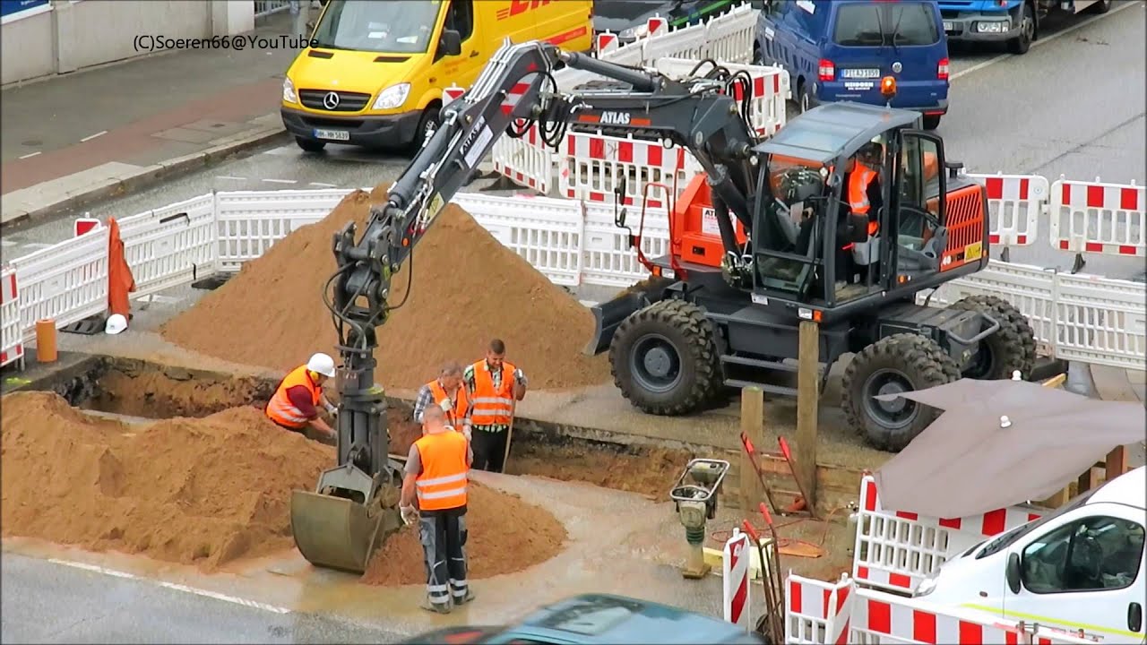 Soeren66 - Bagger ATLAS 140W beim verlegen einer Fernwärmeleitung