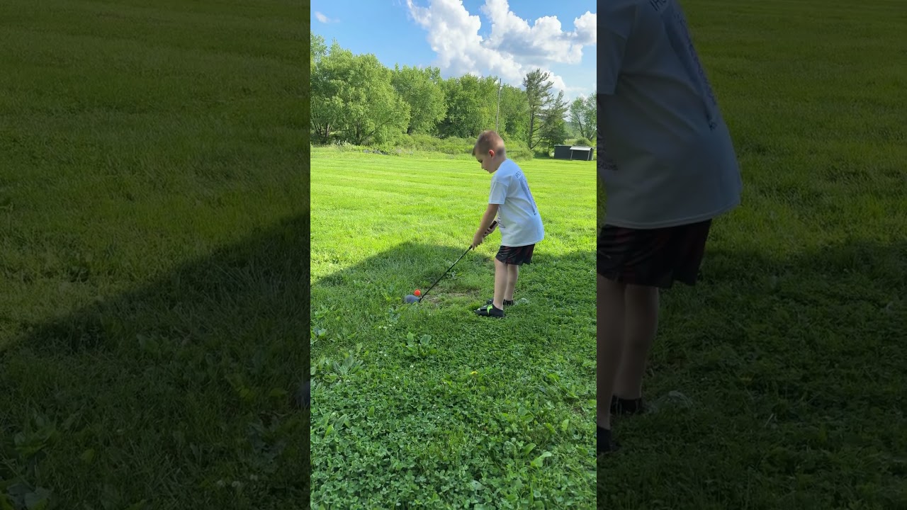 Golfing almost like a pro.   I should be a pro.  