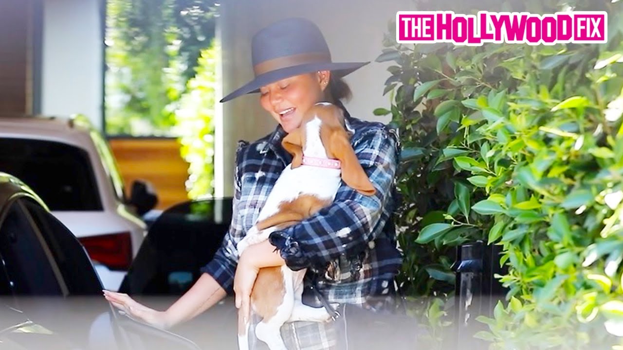 Chrissy Teigen Shows Off The Newest Addition To Her Family While Arriving To Work In Santa Monica