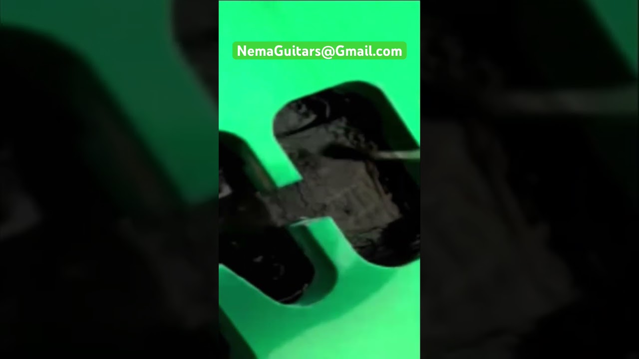 Applying G-Shield paint to an emerald green Nema model ST–25 custom build  