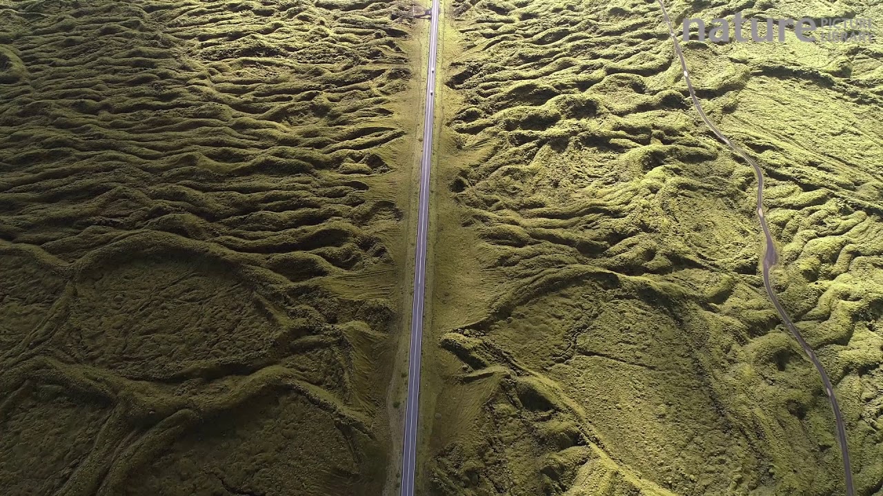 footage of chernobyl Aerial shot of cars on Route 1, passing through a lava flow landscape from the Laki eruption in June