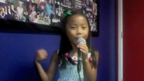 Mackenzie Walker sings "Somewhere Out There" in vo...