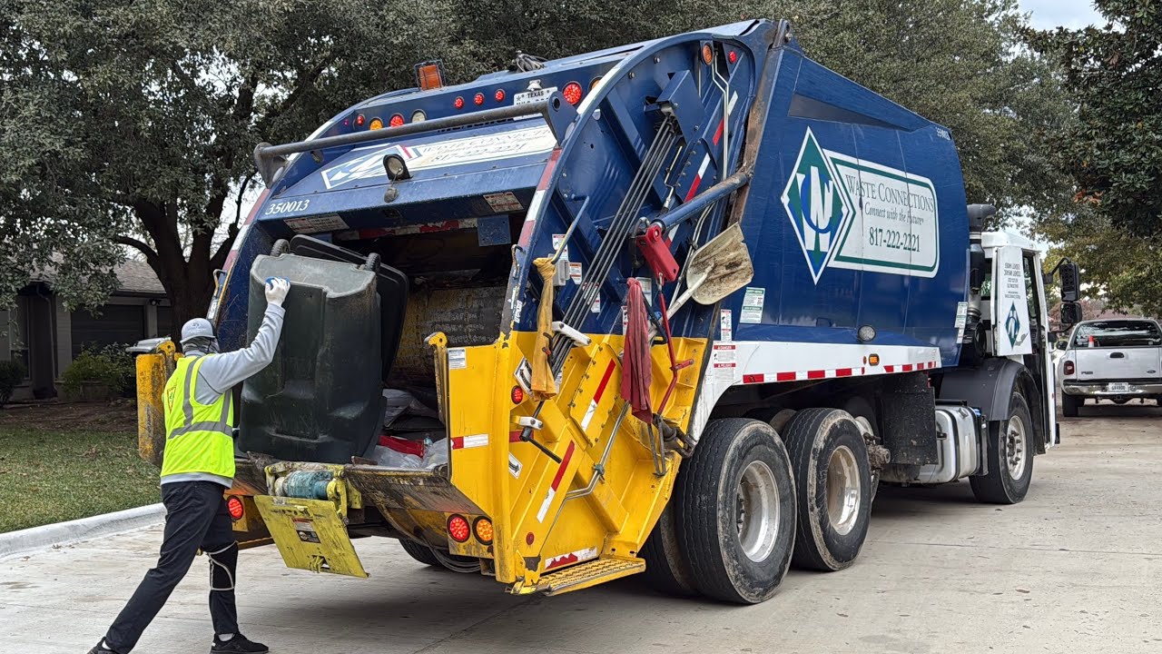 Waste Connections McNeilus Rear Loader Garbage Truck on Manual Trash