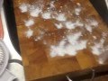 Cleaning the chopping board after cutting meat. Cooking with Dieter. Cleaning the chopping board after cutting meat. Cooking with Dieter.