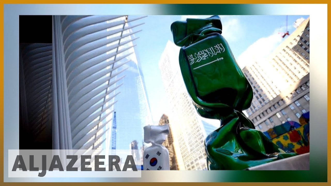 🇸🇦 🇺🇸 إزالة تمثال يحمل العلم السعودي من موقع مركز التجارة العالمي | الجزيرة الإنجليزية