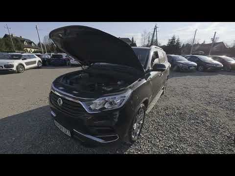 How to find the power steering fluid reservoir on a SsangYong Rexton IV