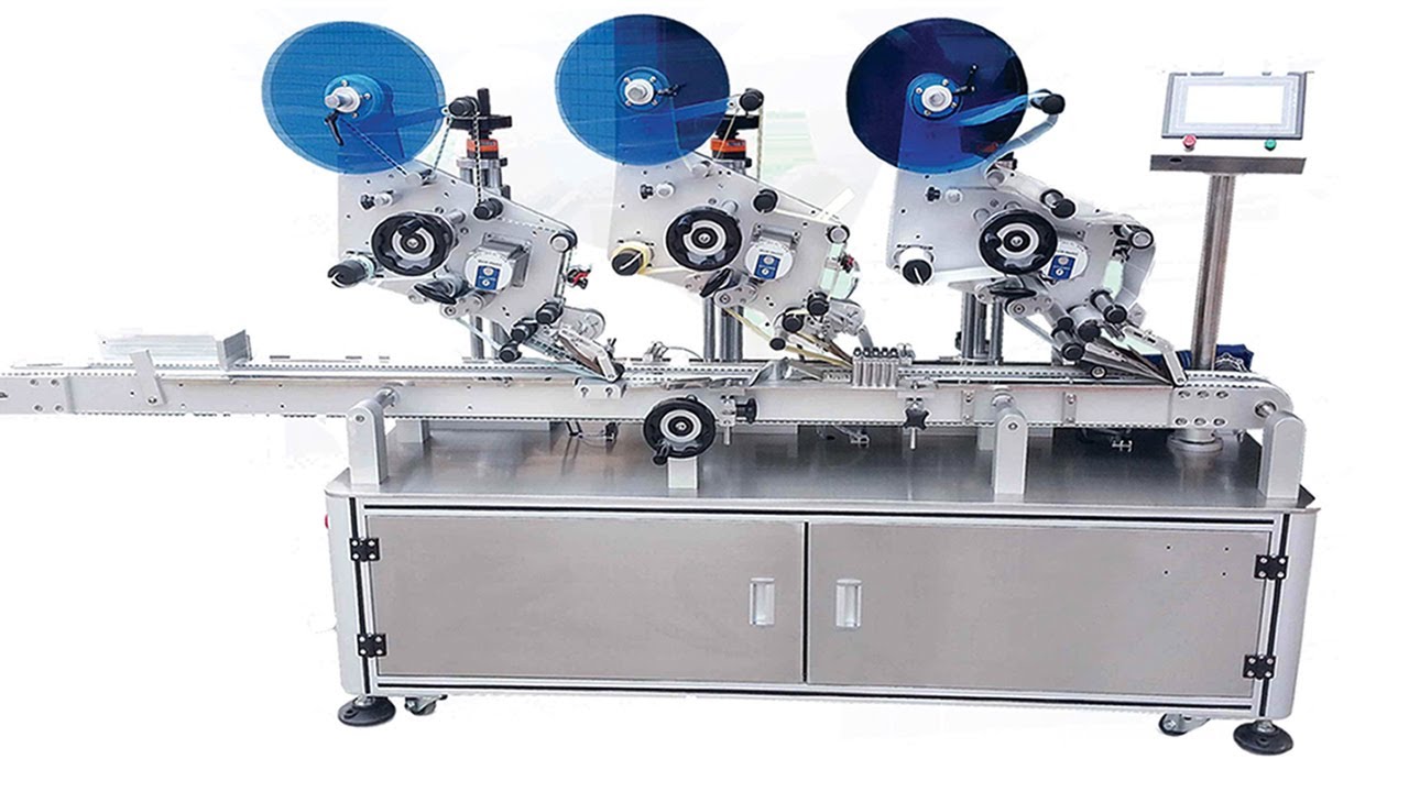 Three labeling heads boxes sticker labeler equipment linear labels