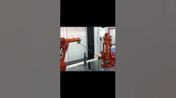 This is not a mirror! This is two robots dancing with swords. #robots #welding #palletizingrobots