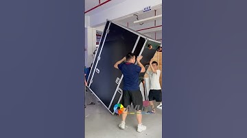 Professional guide of unloading and loading 86inch transparent holobox from flight case manufacturer