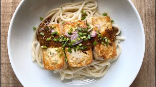 Grilled tofu on noodles with citrus miso dressing
