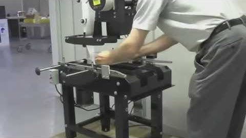 Clamshell Wrap Labeler w/Small Split Conveyor for Top, Side, Bottom Labeling