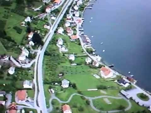 Some people like cruising ON the fjords. Others like cruising ABOVE the fjords. Paragliding from the mountain Smorkletten 800 meters asl and landing in Leikanger. Music: Finger Eleven - Paralyzer