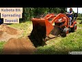 Kubota BX- Spreading top soil + Grading with a loader (No Time-Lapse)