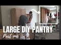 DIY PANTRY | PANTRY WALL | USING UPPER CABINETS TO MAKE A LARGE PANTRY CABINET.